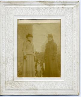 Two Women with a Dog.