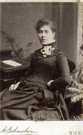 Woman Sitting at her Desk