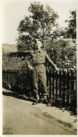 Young man in military uniform