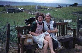 Ladies sitting on garden bench