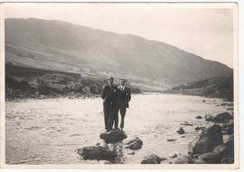 Standing on a rock at the water&#039;s edge