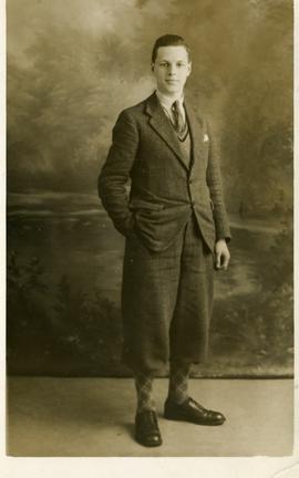 Young man in jacket and plus fours