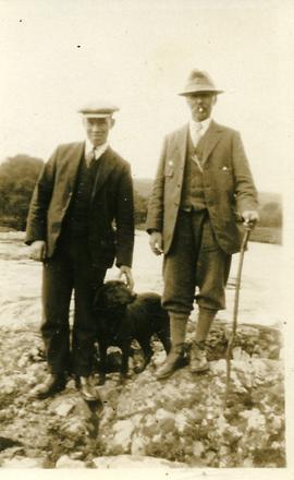 Two Men with a Dog