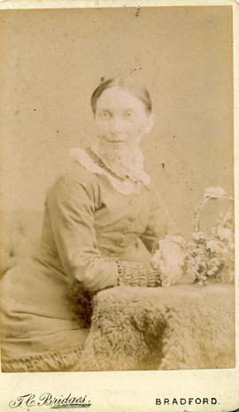 Woman sitting at a Table